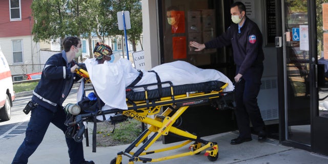 Medical workers bring a patient to the Northbridge https://bt-hypnotise.com/ Care Center in Bridgeport, Conn on April 22, 2020. (AP Photo/Frank Franklin II)