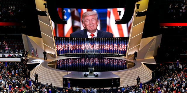 In this July 21, 2016, file photo Republican presidential candidate Donald Trump smiles as he addresses delegates during the final day session of the Republican National Convention in Cleveland.  (AP Photo/Patrick Semansky, File)