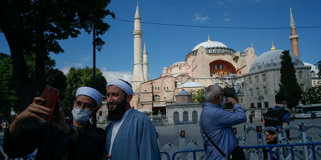 Turkey's President Recep Tayyip Erdogan formally reconverted Hagia Sophia into a mosque and declared it open for Muslim worship, hours after a high court annulled a 1934 decision that had made the religious landmark a museum. (AP Photo/Emrah Gurel)