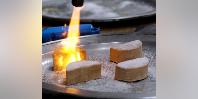 Foie gras is torched and made into a Brulee at the Sent Sovi restaurant in Saratoga, Calif. (AP Photo/Marcio Jose Sanchez, File)