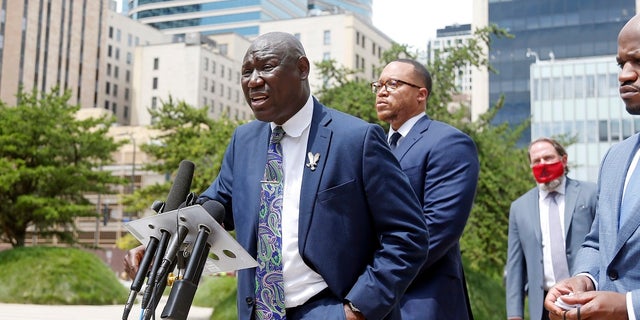 Attorney Ben Crump speaks during a news conference Wednesday in Minneapolis accompanied by co-counsel members, announcing a civil lawsuit against the city of Minneapolis and the officers involved in the death of George Floyd on Memorial Day. (AP Photo/Jim Mone)