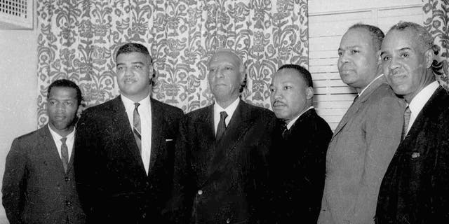 In this July 2, 1963, file photo, six leaders of the nation's largest black civil rights organizations pose at the Roosevelt Hotel in New York. From left, are: John Lewis, chairman Student Non-Violence Coordinating Committee; Whitney Young, national director, Urban League; A. Philip Randolph, president of the Negro American Labor Council; Martin Luther King Jr., president Southern Christian Leadership Conference; James Farmer, Congress of Racial Equality director; and Roy Wilkins, executive secretary, National Association for the Advancement of Colored People.