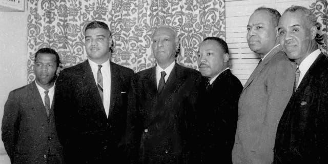 ​​​​​​​Six leaders of the nation's largest black civil rights organizations pose are seen at the Roosevelt Hotel in New York City, July 2, 1963. From left are: John Lewis, chairman Student Non-Violence Coordinating Committee; Whitney Young, national director, Urban League; A. Philip Randolph, president of the Negro American Labor Council; Martin Luther King Jr., president Southern Christian Leadership Conference; James Farmer, Congress of Racial Equality director; and Roy Wilkins, executive secretary, National Association for the Advancement of Colored People. (Associated Press)