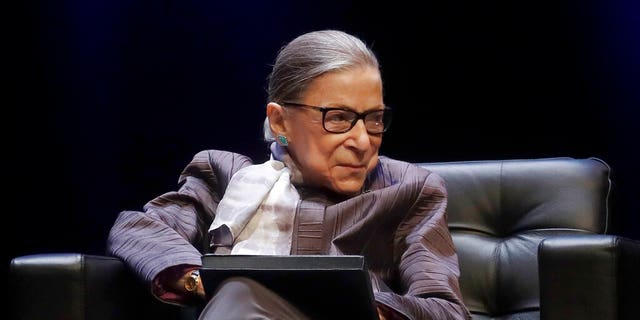 FILE - In this Oct. 21, 2019, file photo U.S. Supreme Court Justice Ruth Bader Ginsburg listens to speakers during the inaugural Herma Hill Kay Memorial Lecture at the University of California at Berkeley in Berkeley, Calif. At 87, Ginsburg is the oldest member of the court. Her next oldest colleagues are 81-year-old Stephen Breyer, 72-year-old Clarence Thomas and 70-year-old Samuel Alito. (AP Photo/Jeff Chiu, File)