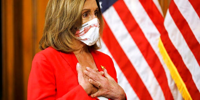 House Speaker Nancy Pelosi attends a ceremonial swearing-in for Congressman-elect Chris Jacobs, R-N.Y., Tuesday, July 21, 2020, on Capitol Hill in Washington. (AP Photo/Jacquelyn Martin)
