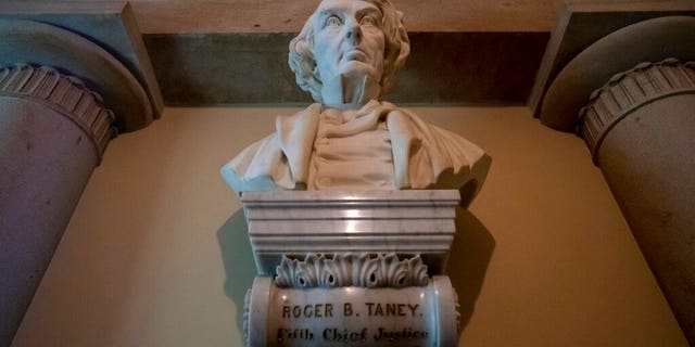 Marble bust of Chief Justice Roger Taney is displayed in the Old Supreme Court Chamber in the U.S. Capitol in Washington. The House will vote Wednesday, July 22, on whether to remove from the U.S. Capitol