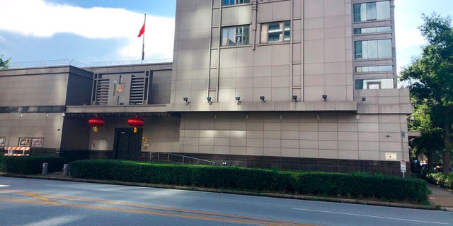 The Chinese Consulate General in Houston. Police and fire officials there responded to reports that documents were being burned in the courtyard of the consulate Tuesday night, according to the Houston Police Department. (AP Photo/John Mone)