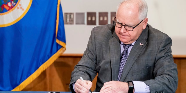 The photo was an apparent reference to the mask mandate imposed by Democrat Gov. Tim Walz. (pictured<br data-cke-eol="1">