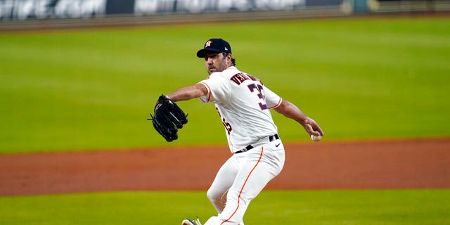 Houston Astros starting pitcher Justin Verlander throws against the Seattle Mariners during the first inning of a baseball game Friday, July 24, 2020, in Houston. (AP Photo/David J. Phillip)