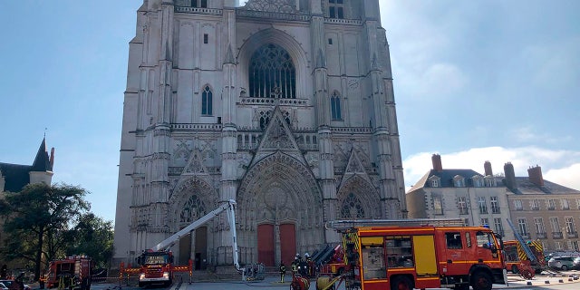 French authorities detained and charged a repentant church volunteer on Sunday, July 26, 2020, after he told investigators he was responsible for an arson attack that severely damaged a 15th-century Gothic cathedral. (AP Photo / Laetitia Notarianni, File)