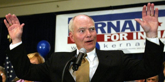FILE - In this Tuesday, Nov. 2, 2004, file photo, Indiana Gov. Joe Kernan acknowledges the applause of supporters as he concedes to Republican challenger Mitch Daniels in the race for governor in Indianapolis. Kernan has died at age 74. His governor's office chief of staff says Kernan died early Wednesday, July 29, 2020 at a South Bend health care facility. (AP Photo/Michael Conroy, File)