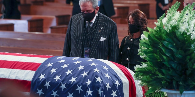 Arthur Blank pays his respects to the late Rep. John Lewis, D-Ga., before the funeral service at Ebenezer Baptist Church in Atlanta, Thursday, July 30, 2020. (Alyssa Pointer/Atlanta Journal-Constitution via AP, Pool)