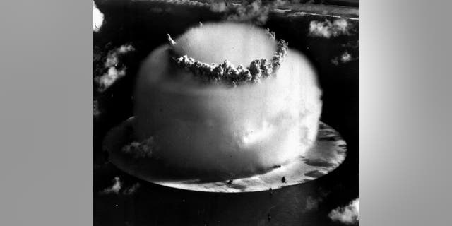 FILE--A huge mushroom cloud rises above Bikini atoll in the Marshall Islands July 25, 1946 following an atomic test blast, part of the U.S. military's "Operation Crossroads." (AP Photo/file)