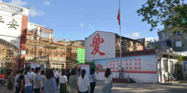 A flag-raising ceremony in the Quannan Christian Church.