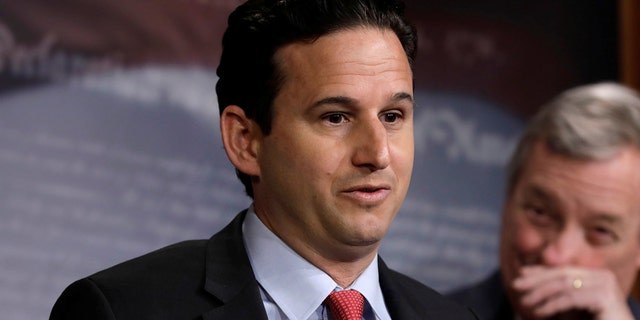 Sen. Brian Schatz, D-Hawaii, said that after pay freezes and shutdowns, federal workers should get "a much-deserved raise."