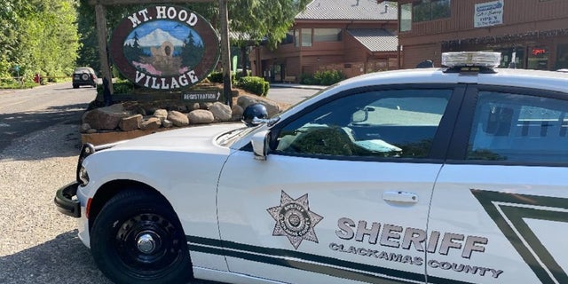 Authorities determined a Sandy, Ore., police officer fatally shot a man and shot a Clackamas County sheriff's deputy during an attempted arrest of the man earlier this month.