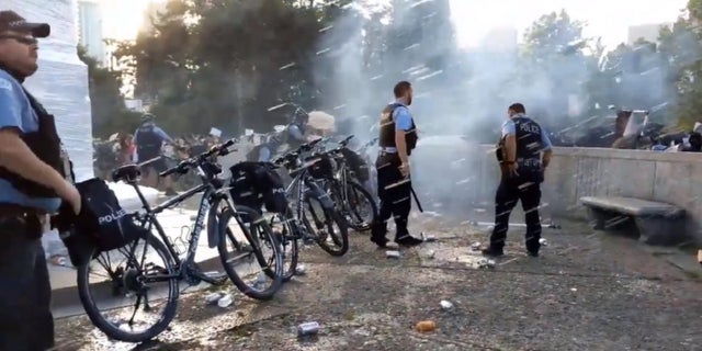 Chicago police officers were pelted with objects during Friday's protests at Grant Park. The demonstration turned violent after some hurled items and clashed with officers, officials said Monday.
