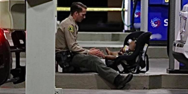 The Lancaster Sheriff's Station posted a picture showing Deputy Josef Schirmeister sitting next to the child to comfort and distract him.