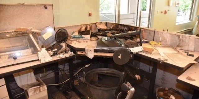 Damage to a work area inside the Portland Justice Center's Corrections Records Office.