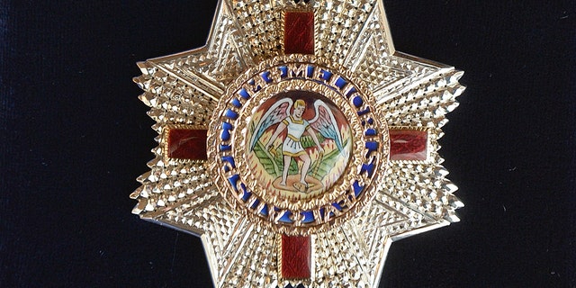 The Insignia of an Honorary Dame Grand Cross of the Most Distinguished Order of St Michael and St George has been criticized for its imager in the wake of the death of George Floyd.