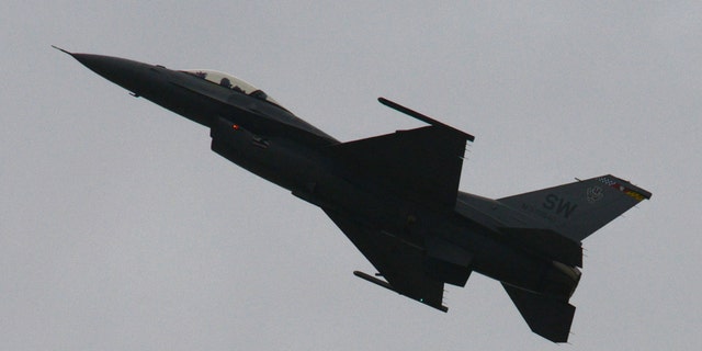 An F-16CM Fighting Falcon, flown by U.S. Air Force Maj. Craig Baker, Air Combat Command Viper Demo Team pilot, flies through the air during a demonstration practice at Shaw Air Force Base, S.C., Jan. 15, 2016. Baker flies to demonstrate the combat capabilities of the F-16, similar to the tactics used while the F-16s are deployed. (U.S. Air Force photo by Airman 1st Class Destinee Dougherty)