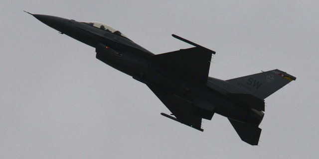An F-16CM Fighting Falcon, flown by U.S. Air Force Maj. Craig Baker, Air Combat Command Viper Demo Team pilot, flies through the air during a demonstration practice at Shaw Air Force Base, S.C., Jan. 15, 2016. Baker flies to demonstrate the combat capabilities of the F-16, similar to the tactics used while the F-16s are deployed. (U.S. Air Force photo by Airman 1st Class Destinee Dougherty)