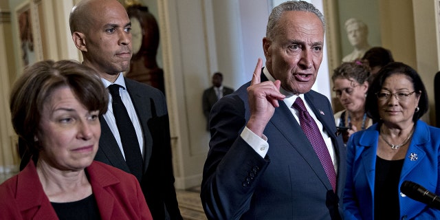 Booker says he doesn't know 'much' about Demand Justice despite speaking at events 2 Senate Minority Leader Chuck Schumer, DN.Y., after a weekly caucus meeting at the United States Capitol in Washington, DC, U.S., Tuesday, July 10, 2018.