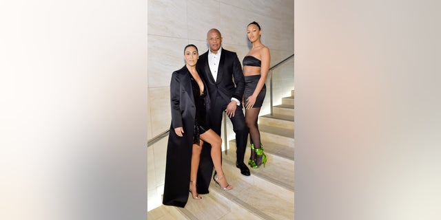 Nicole Young, Dr. Dre, and Truly Young attend Tom Ford: Autumn/Winter 2020 Runway Show at Milk Studios on February 07, 2020, in Los Angeles, Calif.