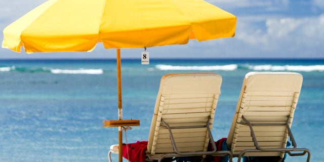 Beach umbrellas can pose a hazard when they become loose from their anchors in the sand and get caught in gusty winds.