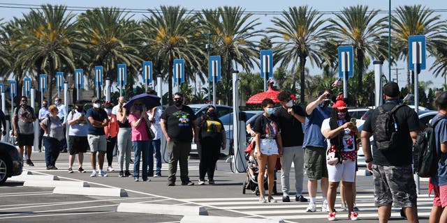 Hundreds of people were seen lining up as early as 5 a.m. – and some the night before – for the 10 a.m. reopening of Disneyland’s Downtown district Thursday.