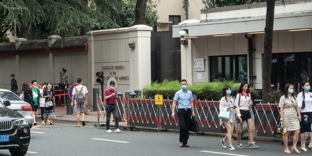 CHENGDU, CHINA - JULY 23: People walk by the US Consulate-General in Chengdu on July 23, 2020 in Chengdu, Sichuan Province of China. (Photo by VCG via Getty Images)