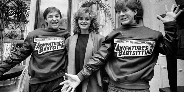 'Adventures in Babysitting' stars Keith Coogan, left, Elisabeth Shue, center, Anthony Rapp, right, on February 20, 1987.