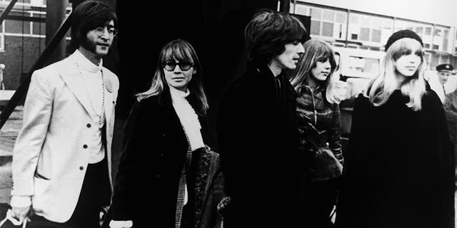 Beatles John Lennon (1940 - 1980) and George Harrison (1943 - 2001) leave Heathrow Airport for two months' transcendental meditation at Rishikesh in the Himalayas with the Maharishi Mahesh Yogi, 15th February 1968. Accompanying them are their wives Cynthia and Patti, and Patti's younger sister Jenny. The other two Beatles are due to join them later