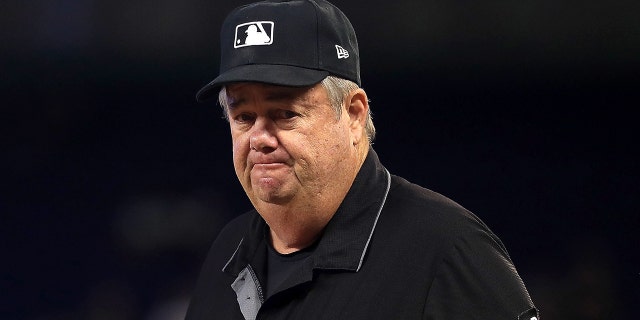 Umpire Joe West looks on during a game between the Miami Marlins and the Cincinnati Reds at Marlins Park on July 27, 2017, in Miami. (Photo by Mike Ehrmann/Getty Images)