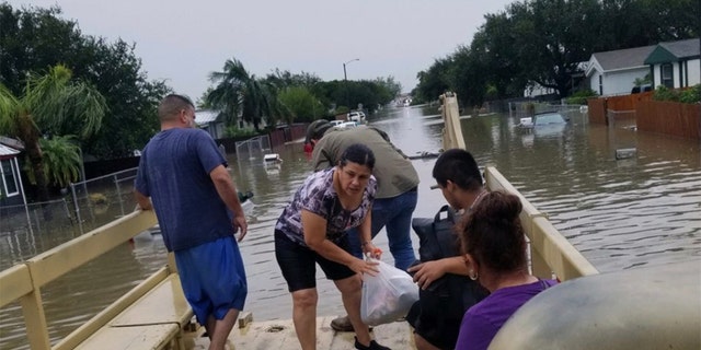 A Border Patrol employee used his personal military truck to help evacuate 120 residents in Mission, Texas on Monday.