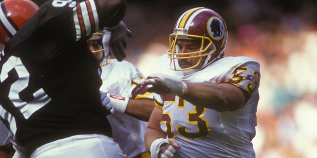 WASHINGTON - OCTOBER 13: Jeff Bostic #63 of the Washington Redskins makes a block during a NFL football game against the Cleveland Browns on October 13, 1991 at RFK Stadium in Washington DC. (Photo by Mitchell Layton/Getty Images)