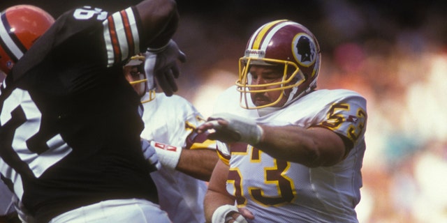 WASHINGTON - OCTOBER 13: Jeff Bostic #63 of the Washington Redskins makes a block during a NFL football game against the Cleveland Browns on October 13, 1991 at RFK Stadium in Washington DC. (Photo by Mitchell Layton/Getty Images)