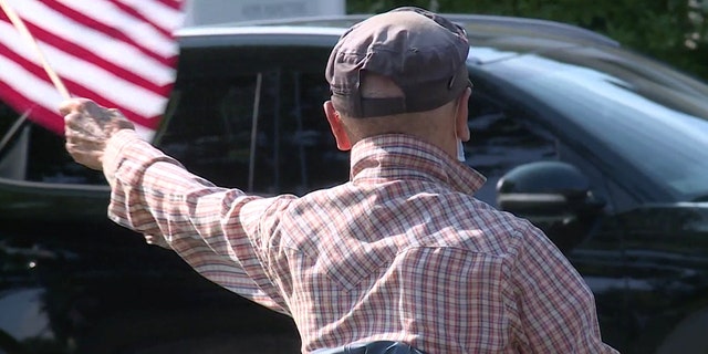 Many passing drivers wave or honk their horns when they go by.(Courtesy FOX61)