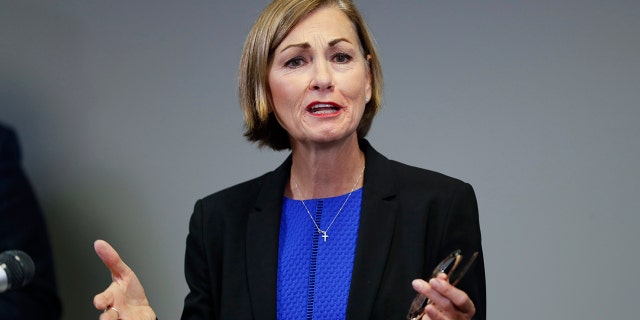 FILE - In this July 7, 2020 file photo, Iowa Gov. Kim Reynolds speaks during a news conference in Urbandale, Iowa. (AP Photo/Charlie Neibergall, File)