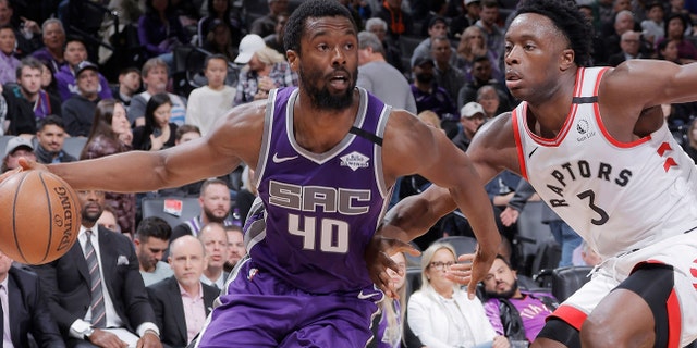 SACRAMENTO, CA - MARCH 8: Harrison Barnes #40 of the Sacramento Kings drrives against OG Anunoby #3 of the Toronto Raptors on March 8, 2020 at Golden 1 Center in Sacramento, California. NOTE TO USER: User expressly acknowledges and agrees that, by downloading and or using this photograph, User is consenting to the terms and conditions of the Getty Images Agreement. Mandatory Copyright Notice: Copyright 2020 NBAE (Photo by Rocky Widner/NBAE via Getty Images)