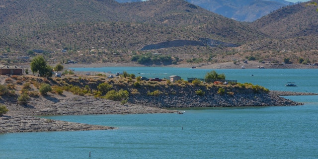 One person was killed and two others critically injured at a lake in Arizona on Sunday night after a possible electrocution incident, according to officials.