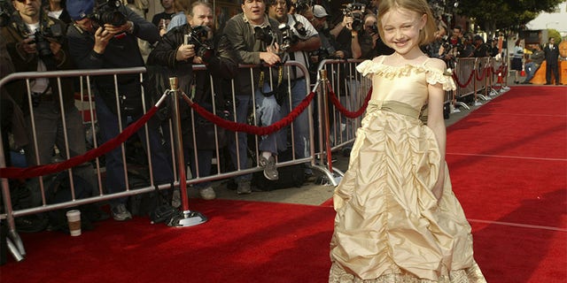 Dakota Fanning during 'Man on Fire' red carpet premiere in Los Angeles.