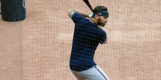 Minnesota Twins third baseman Josh Donaldson takes a practice swing during baseball practice Wednesday, July 8, 2020, in Minneapolis. The baseball team added Donaldson among a couple of potentially high impact players to the team that won 101 games last season. (AP Photo/Jim Mone)