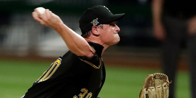 Pittsburgh Pirates relief pitcher Kyle Crick delivers during the eighth inning of an exhibition baseball game against the Cleveland Indians in Pittsburgh, Saturday, July 18, 2020. (AP Photo/Gene J. Puskar)