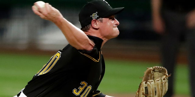 Pittsburgh Pirates relief pitcher Kyle Crick delivers during the eighth inning of an exhibition baseball game against the Cleveland Indians in Pittsburgh, Saturday, July 18, 2020. (AP Photo/Gene J. Puskar)