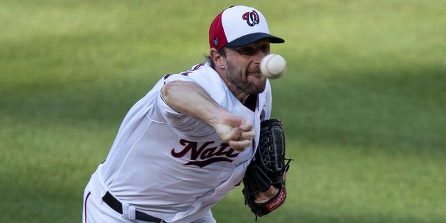 Washington Nationals starting pitcher Max Scherzer throws during the first inning of an exhibition baseball game against the Philadelphia Phillies at Nationals Park, Saturday, July 18, 2020, in Washington. (AP Photo/Alex Brandon)
