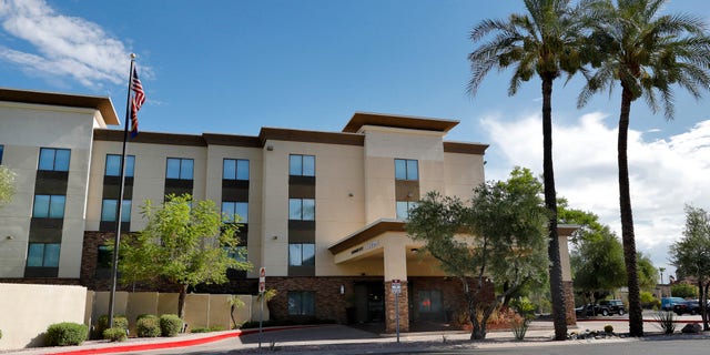 A Hampton Inn is shown Tuesday, July 21, 2020 in Phoenix. (AP Photo/Matt York)