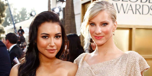 Naya Rivera (left) and Heather Morris arrive at the 68th Annual Golden Globe Awards held at the Beverly Hilton Hotel on January 16, 2011 (Photo by Trae Patton/NBCU Photo Bank/NBCUniversal via Getty Images via Getty Images)