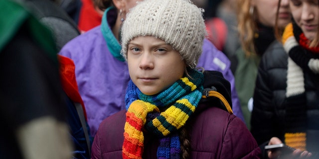 Swedish climate activist Greta Thunberg takes part in a rally 