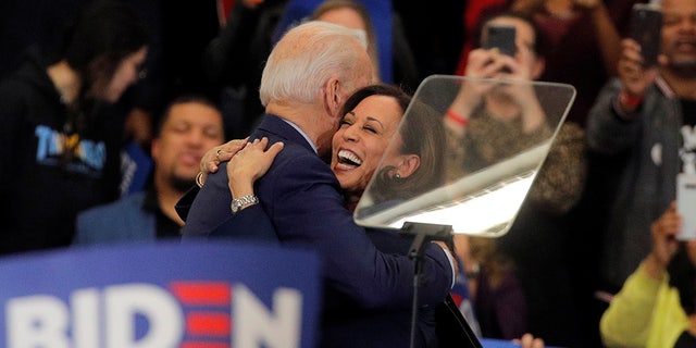 Democratic U.S. presidential candidate and former Vice President Joe Biden is greeted by U.S. Senator Kamala Harris during a campaign stop in Detroit, Michigan, U.S., March 9, 2020. 